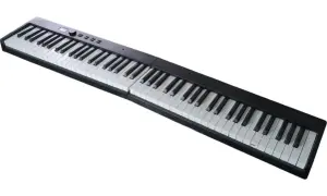 Czarny keyboard z białymi klawiszami, gotowy do zagrania pięknych nut na fortepian.