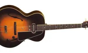 Gitara elektryczna w stylu vintage, z klonowym gryfem i korpusem w kolorze sunburst. Do gry potrzebne są struny, wzmacniacz i kostka.