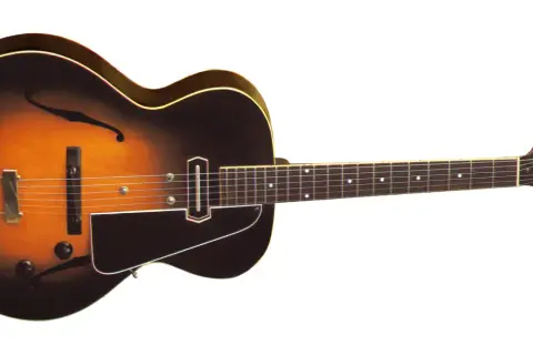 Gitara elektryczna w stylu vintage, z klonowym gryfem i korpusem w kolorze sunburst. Do gry potrzebne są struny, wzmacniacz i kostka.
