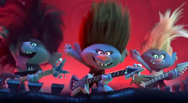 Trzy trolle rockmani grają na gitarach, tworząc energetyczne trolle piosenki.