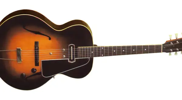 Gitara elektryczna w stylu vintage, z klonowym gryfem i korpusem w kolorze sunburst. Do gry potrzebne są struny, wzmacniacz i kostka.