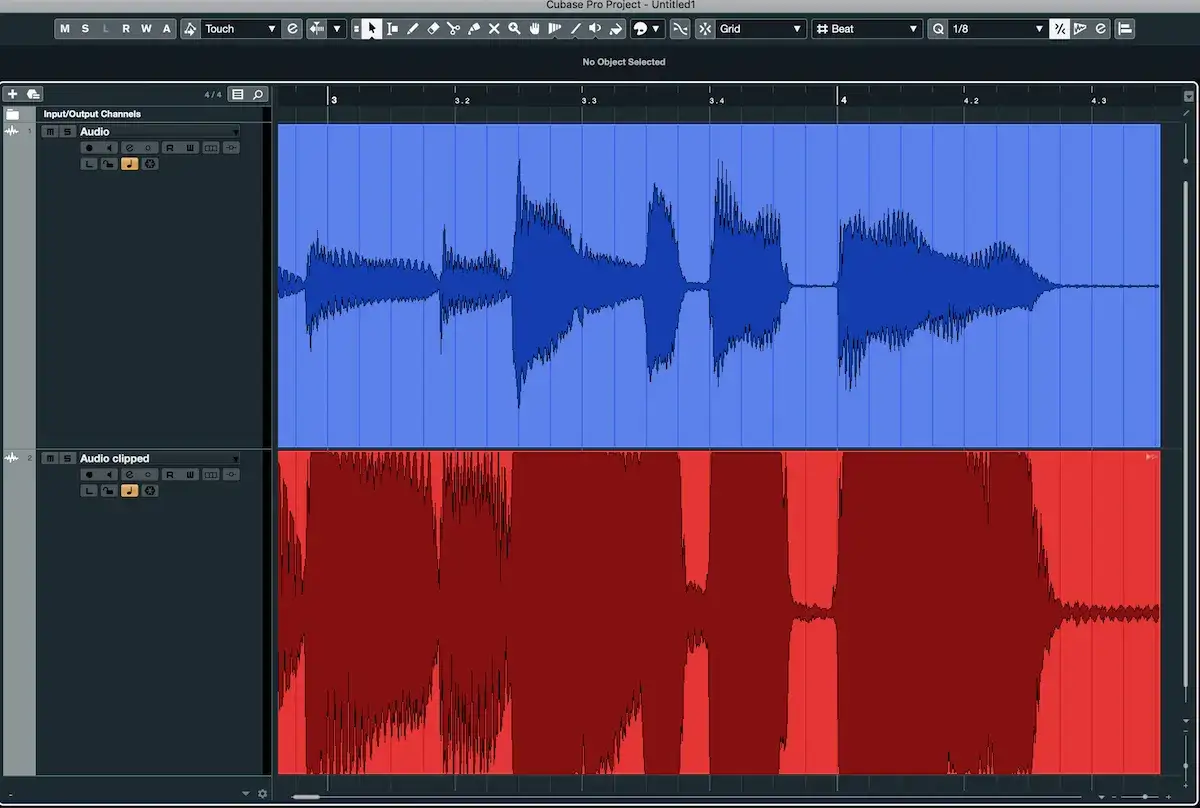 Dwa kanały audio w programie Cubase. Górny, niebieski, wygląda na czysty. Dolny, czerwony, pokazuje wyraźny przester, zniekształcając dźwięk.